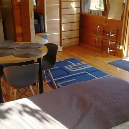 Деревянный коттедж Letniskowy W Centrum Mikolajek *